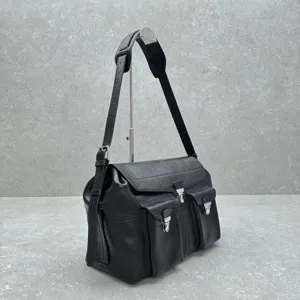 Black genuine leather messenger bag with multi pockets and metal closures for daily use.