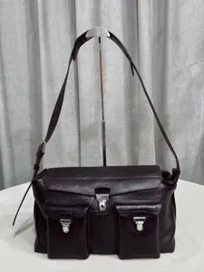 Premium leather messenger bag for women, vintage style shoulder bag with metal lock.