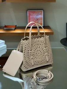 Beige leather laser-cut tote bag women chic casual top handle shoulder crossbody bag.