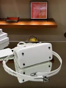 White genuine leather laser cut bucket bag, casual chic shoulder crossbody handbag.