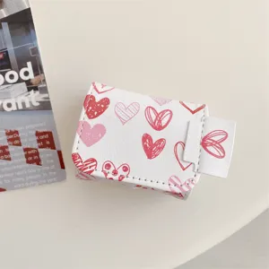White leather sketch heart AirPods case, wireless earphone protective cover detail view.
