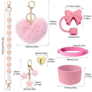 Rosa Stanley Tassen Zubehör Set mit Strohhalmabdeckung, Silikonboden und süßem Anhänger.