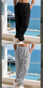 Detail view of men's casual linen cuffed pants, loose fit beach trousers in black and grey.