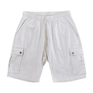 Grey cargo shorts detail view, featuring adjustable drawstring waist and functional side pockets.