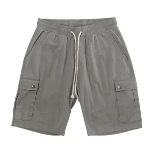 Close-up view of the casual cargo shorts featuring multi-pockets and elastic drawstring waist.