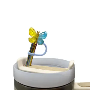 Copertura per cannuccia a farfalla colorata con cannuccia di metallo e tappo antipolvere.