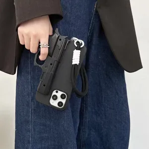 Creative gun shaped phone case for iPhone 16, black textured cover with woven lanyard.