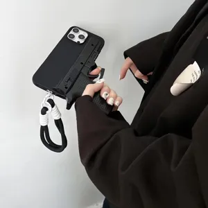 Creative pistol shape shockproof phone case with a stylish braided lanyard detail view.