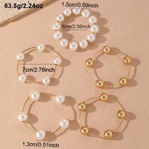 Set de pulseras superpuestas con perlas y cuentas doradas para mujer, joya muy elegante.