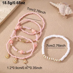 Σετ βραχιόλια με ροζ χάντρες boho με χρυσά charms κοχυλιών και λευκές πέτρες