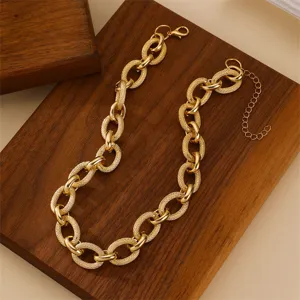Chunky gold metal link necklace, bold hip-hop style chain for women fashion accessory.