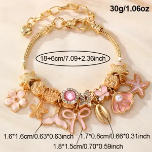 Goldfarbenes Bettelarmband mit rosa Emaille Blume Seestern Muschel Anhängern Damenschmuck