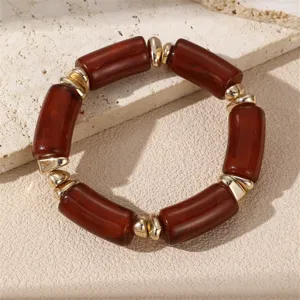 Schickes braunes Kunstharz Perlen Armband mit goldfarbenen Metallakzenten, Modeschmuck.