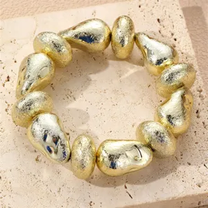 Goldene unregelmäßige geometrische Perlenarmband Vintage Retro Statement Schmuck Detail Ansicht