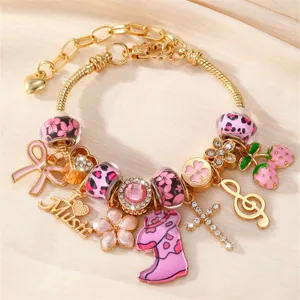 Goldener Bettelarmband Detail mit rosa Leopardenperlen, süßer Schleife und Musik Anhängern.