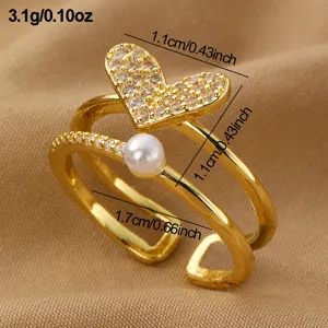 Goldfarbener doppelschichtiger Offener Ring mit funkelndem Zirkonia-Herz und Perlendesign.