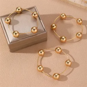Juego de pulseras de cuentas doradas para mujer, joyería de muñeca de cadena moderna.