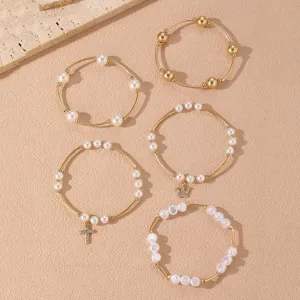 Juego de pulseras multicapa para mujer, cadena dorada con perlas, cruz y corona.