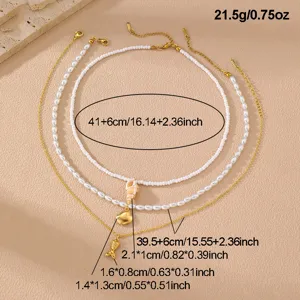 Mehrlagige Perlen Muschel Choker Halskette Set mit goldenen Anhängern für Damen Mode.