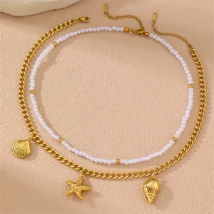 Zweilagige Ozean Stil Halskette mit Perlenkette, Goldkette, Seestern und Muschel Anhaengern.