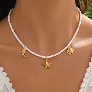 Weiße Perlenkette mit goldenen Seestern Fischschwanz Anhängern Ozean Stil Schmuck