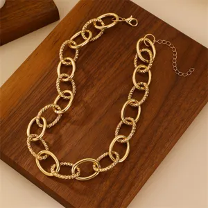 Gold metal chunky chain necklace, exaggerated hip hop style statement jewelry for women.