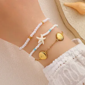 Nahaufnahme Detail des böhmischen Strand mehrschichtigen Muschel Seestern Armbands.