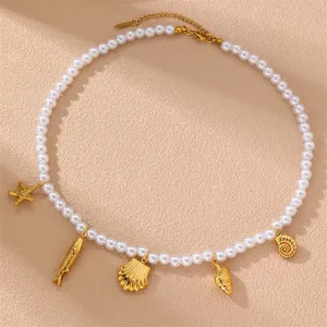 Elegante Perlen-Choker-Halskette mit goldenen Meeres-Charms, Muschel Seestern Modeschmuck Damen.