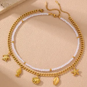Doppelreihige goldene Kette mit Meeresanhängern Seestern Muschel Perlen für Damen Detail