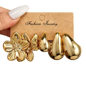 Elegantes Gold Metall Blumen und Tropfen Ohrring Set, moderner minimalistischer Schmuck.