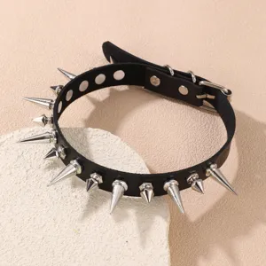 Punk style black leather choker necklace with metal spikes, edgy fashion neck jewelry accessory.