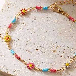 Minimalist alloy little daisy bead anklet for women, stylish beach vacation jewelry.