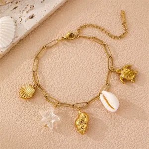 Goldenes Ozean-Anhänger-Armband mit Schildkröte, Seestern und Muscheln für Strandurlaub.