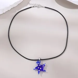 Damen Mode schwarze Kordel Halskette mit blauem Glas Seestern Anhänger mit weißen Punkten
