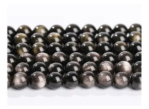 Close-up detail showing the natural sheen of silver obsidian round loose beads
