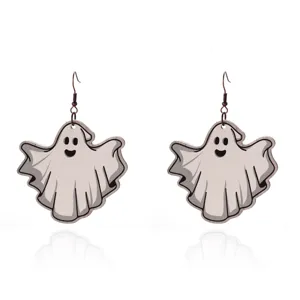 Detail shot of cute white Halloween ghost earrings featuring a classic cartoon smile.