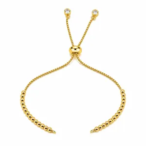 Goldfarbenes Box-Chain-Schiebearmband mit verstellbarem Perlenverschluss und Kristallanhängern.