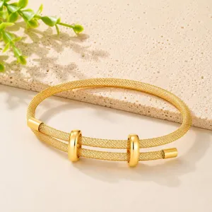 Bracciale rigido intrecciato in rete dorata con doppio anello scorrevole design chic