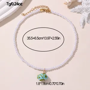 Elegante Perlenkugel-Choker-Halskette mit süßem blauem Fisch-Anhänger für Damen.