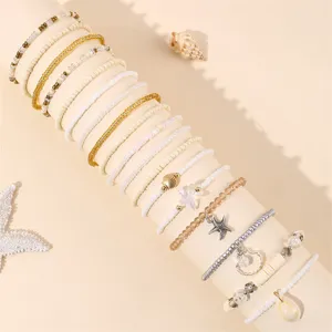 Böhmisches Perlenarmband Set mit Muschel und Seestern Anhängern für den Strandurlaub.