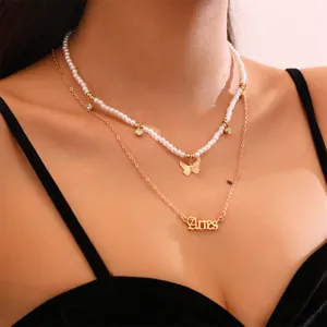 Zweilagige Perlen Schmetterling Halskette mit Sternzeichen Widder Anhänger Modeschmuck
