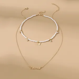 Doppellagige Perlen Schmetterling Anhänger Halskette Set mit Aquarius Sternzeichen.