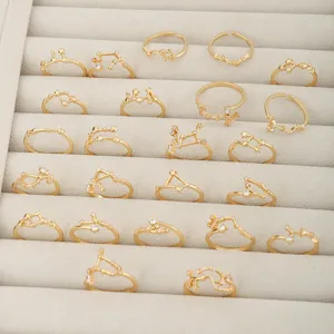 Set von 12 Sternzeichen Ringe, goldene verstellbare offene Zirkonia Ringe fuer Damen.