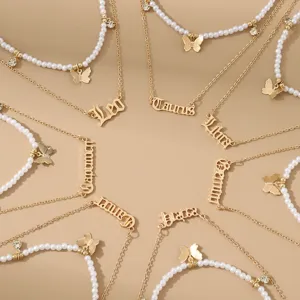 Modische 12 Sternzeichen Halskette Set mit Perlenkette und goldenem Schmetterling Schmuck
