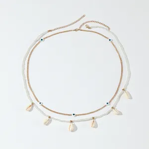 Catena da vita multi-strato boho con conchiglie e perline malocchio per donna spiaggia.