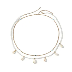Catena da corpo multistrato boho con perline delicate, conchiglie e ciondoli malocchio per la spiaggia.