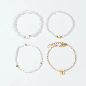 Set aus 4 Perlenarmbändern mit Sternzeichen Anhänger für Damen elegante minimalistische Schmuck