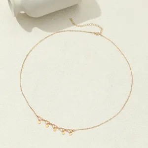 Gold heart charm body chain waist chain delicate summer fashion jewelry closeup detail view