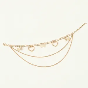 Gold multi-layer butterfly and heart chain anklet fashion foot jewelry for women.