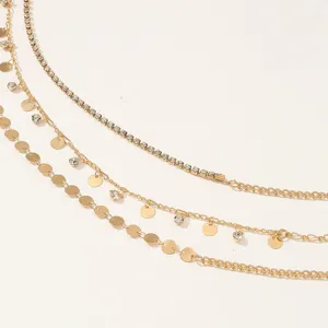 Multi-layer gold waist chain with rhinestones and disc charms, sexy and stylish body jewelry.